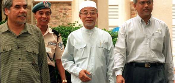 Mustafa Ali (R), Fadzil Noor (C) and Mahfuz Omar (L). UPALI ATURUGIRI/AFP/Getty Images