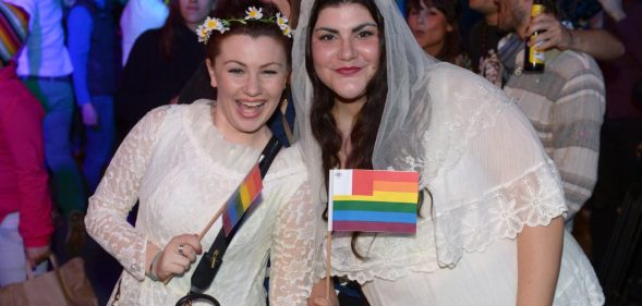 Couple celebrating same-sex marriage in Malta