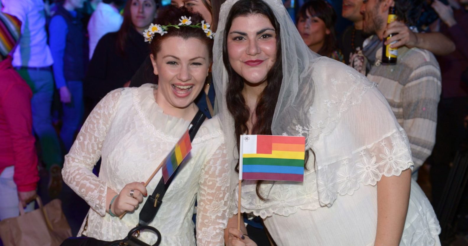 Couple celebrating same-sex marriage in Malta