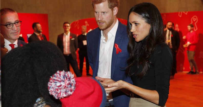 Prince Harry and his fiancee US actress Meghan Markle visit the Terrence Higgins Trust World AIDS Day charity fair (Getty)
