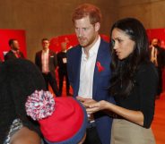 Prince Harry and his fiancee US actress Meghan Markle visit the Terrence Higgins Trust World AIDS Day charity fair (Getty)