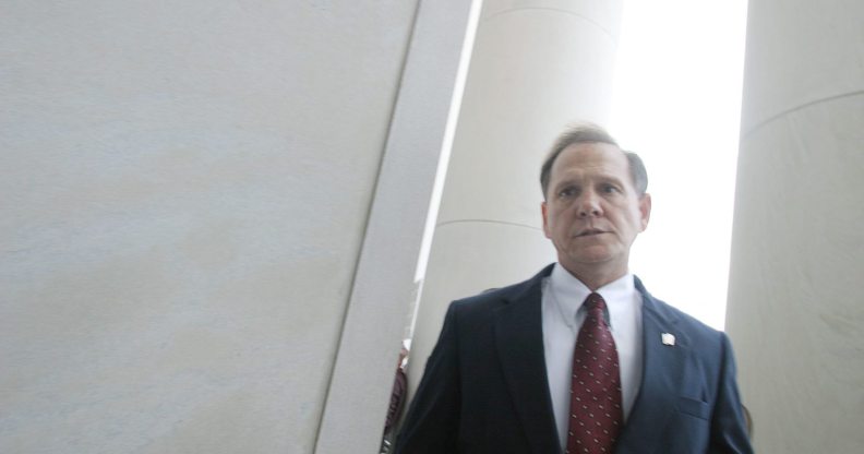 MONTGOMERY, AL ? AUGUST 21: Alabama Supreme Court Chief Justice Roy Moore walks back into the state Judicial Building after addressing supporters August 21, 2003 in Montgomery, Alabama. The eight other justices today overruled Moore?s defiance of a federal court order to remove a 5,300 lb granite monument of the Ten Commandments that is exhibited in the Judicial Building. Moore defied a deadline to get rid of the monument by midnight today. The U.S. Supreme Court declined to consider the issue Wednesday. (Photo by Gary Tramontina/Getty Images)
