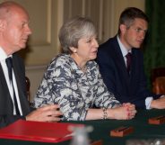 LONDON, ENGLAND - JUNE 26: Prime Minister Theresa May (2L) sits with First Secretary of State Damian Green (L), and Parliamentary Secretary to the Treasury, and Chief Whip, Gavin Williamson (3L) as they talk with Democratic Unionist Party (DUP) leader Arlene Foster, DUP Deputy Leader Nigel Dodds, and DUP MP Jeffrey Donaldson (not seen) inside 10 Downing Street on June 26, 2017 in London, England. Prime Minister Theresa May's Conservatives signed a deal Monday with Northern Ireland's Democratic Unionist Party that will allow them to govern after losing their majority in a general election this month. (Photo by Daniel Leal-Olivas - WPA Pool /Getty Images)