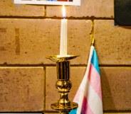 A candle mourns transgender victims of violence like Tydie, who was killed in Baltimore.