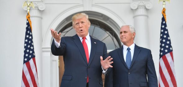 US President Donald Trump and Vice President Mike Pence speak to the press on August 10, 2017, at Trump's Bedminster National Golf Club in New Jersey before a security briefing. / AFP PHOTO / Nicholas Kamm (Photo credit should read NICHOLAS KAMM/AFP/Getty Images)