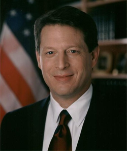 Al Gore in front of an American flag