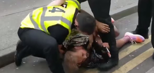 Ferhan Khan being tackled by Birmingham Pride security staff