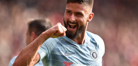 Chelsea's French striker Olivier Giroud celebrates after Chelsea's English midfielder Ross Barkley (unseen) scored his team's second goal during the English Premier League football match between Southampton and Chelsea at St Mary's Stadium