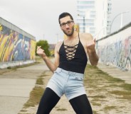 A still from a video of the founder of queer protest group WERK for Peace, Firas Nasr, dancing at the Berlin Wall