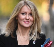 Esther McVey smiling as she walks in 10 Downing Street