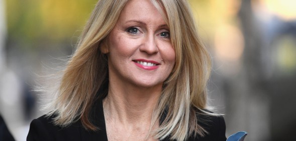 Esther McVey smiling as she walks in 10 Downing Street