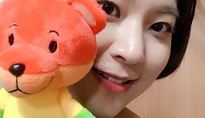 Writer Eun Ha-sun poses with a LGBT teddy bear in a photo uploaded on Facebook, where she tricked homophobes to donate to the Seoul Pride festival