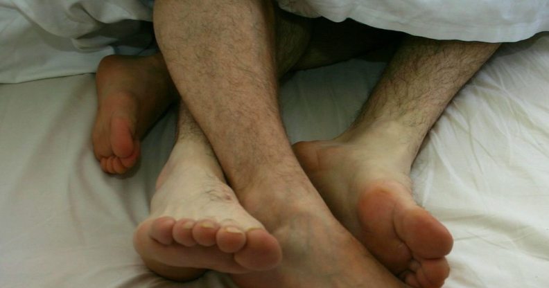 A gay couple in bed
