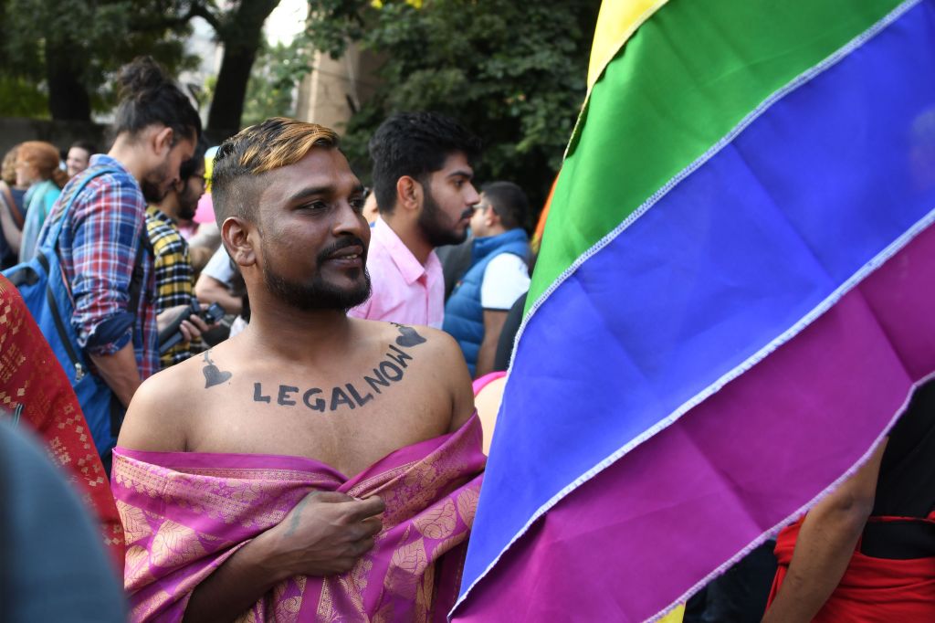 A man with "legal now" takes part in a pride parade in Delhi on November 25, 2018, the first since the Supreme Court decriminalised gay sex, a landmark moment defining 2018