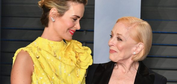 Sarah Paulson (L) and wife Holland Taylor attend the 2018 Vanity Fair Oscar Party.