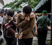 Gay men in Indonesia being led to be lashed 83 times for having gay sex