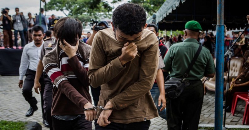 Gay men in Indonesia being led to be lashed 83 times for having gay sex