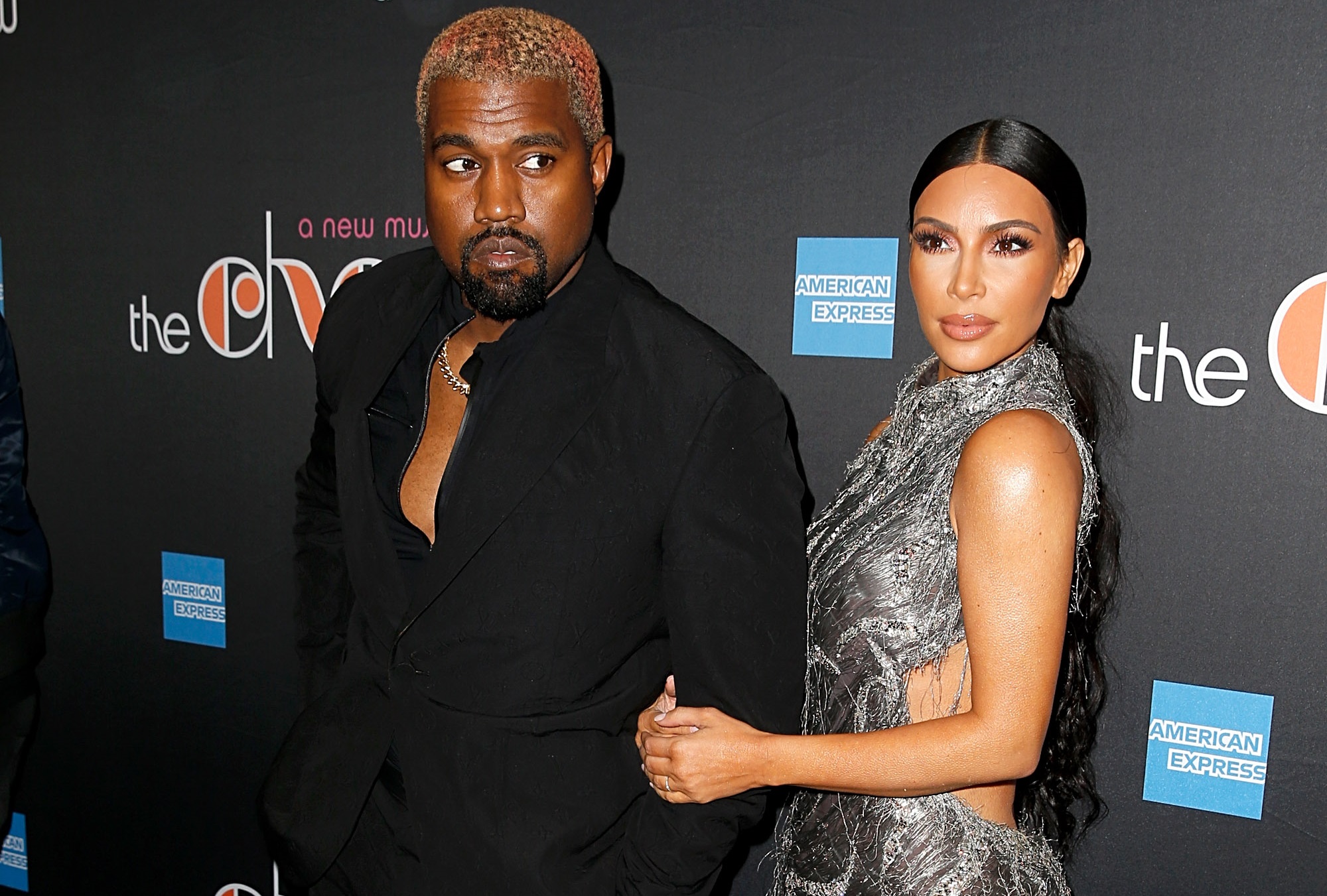 Kanye West apologises after he's caught texting at Cher show PinkNews