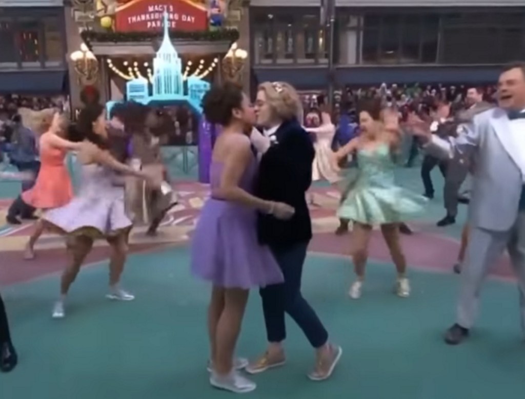Two women kiss during a performance of "Build a Prom" at the Macy’s Thanksgiving Day Parade
