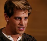 Milo Yiannopoulos reacts during a press conference on arrival at the Sydney International Airport on November 29, 2017