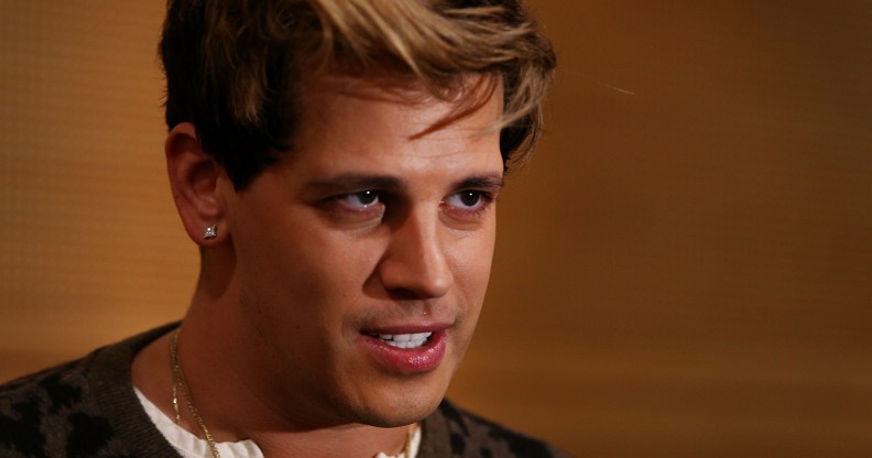 Milo Yiannopoulos reacts during a press conference on arrival at the Sydney International Airport on November 29, 2017