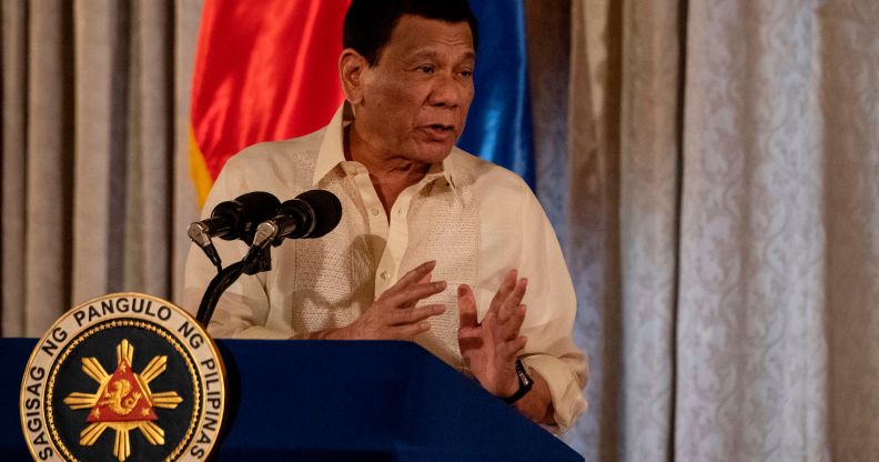 Philippine President Rodrigo Duterte speaking at a podium