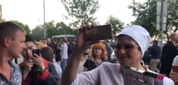 Protesters outside the 'Side By Side' film festival in Moscow. (Dozhd TV)