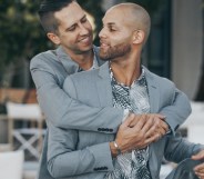 New York City married couple Alex Majkowski and Taray Carey embrace