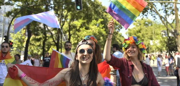 Participants wave Rainbow Flags as they take part in the WorldPride 2017 parade in Madrid