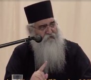 Bishop Neophytos of Morphou speaking into a microphone