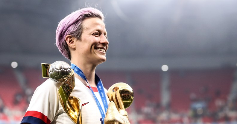 Megan Rapinoe with world cup trophy