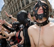 Men in bondage wear at Pride