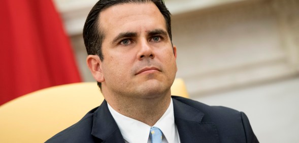 Governor Ricardo Rossello of Puerto Rico attends a meeting with President Donald Trump in the Oval Office at the White House on October 19, 2017 in Washington, D.C.