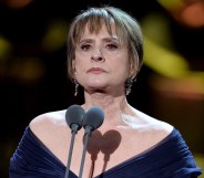 Patti Lupone behind a microphone