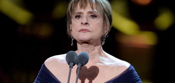 Patti Lupone behind a microphone