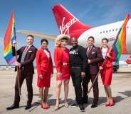 LGBT+ flight crew hold rainbow flags alongside Jodie Harsh and Tituss Burgess