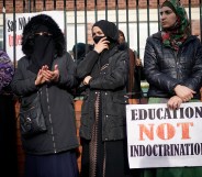 Parents, children and protesters demonstrate against the 'No Outsiders' programme, which teaches children about LGBT rights, at Parkfield Community School on March 21, 2019 in Birmingham, England.