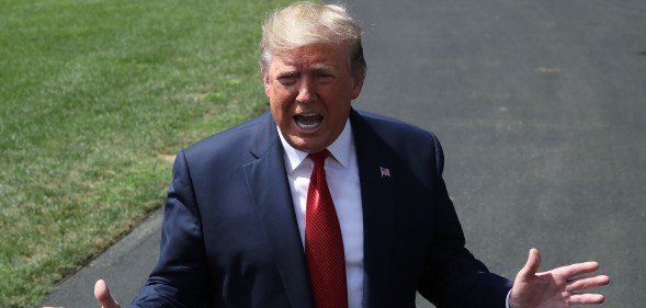 President Donald Trump speaks to the media before departing from the White House on August 21, 2019 in Washington, DC.