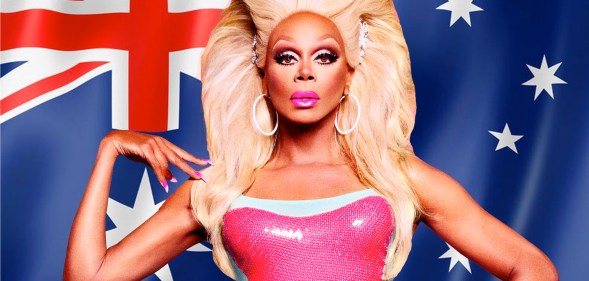 RuPaul in front of an Australian flag