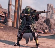 Borderlands 3 character FL4k, a heavily armoured robot, holds a gun