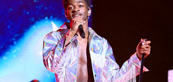 Lil Nas X in a silver fringed jacket