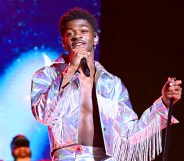Lil Nas X in a silver fringed jacket