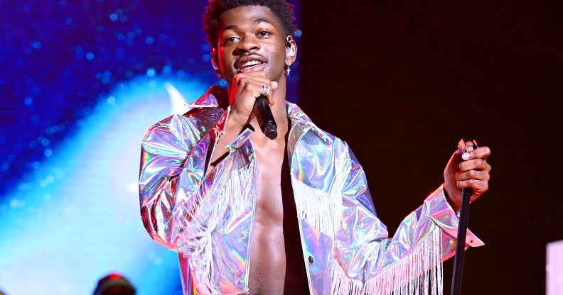 Lil Nas X in a silver fringed jacket