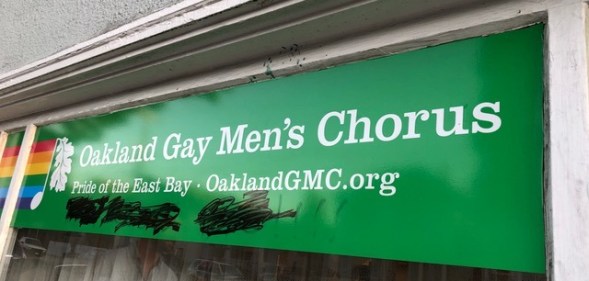 The Oakland Gay Men's Chorus group had their sign defaced