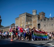 Cardiff, Wales, UK, August 24th 2019. The head of the Welsh parade passes Cardiff Castle during the Pride Cymru parade as part of a weekend of celebrations on the 20th anniversary of the event. (Photo credit should read Mark Hawkins/Composed Images / Barcroft Media via Getty Images)