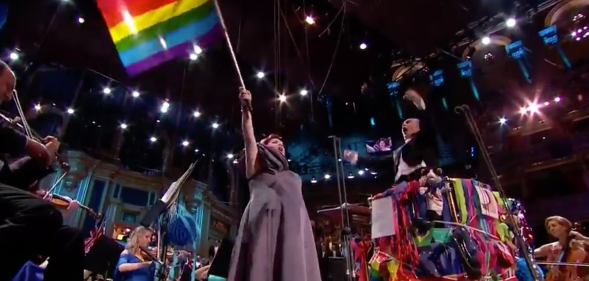 Bisexual opera singer Jamie Barton, waving a Pride flag during her rendition of 'Rule Brittania' (Screenshot/BBC)