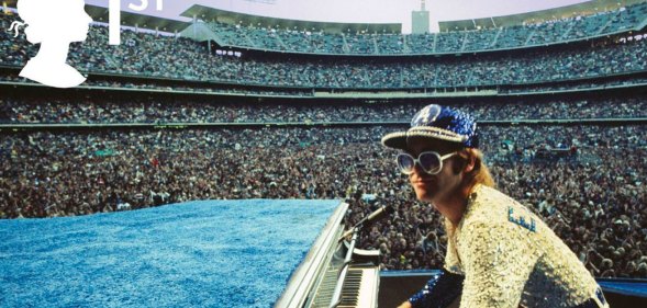 Elton John playing the piano at Dodger Stadium