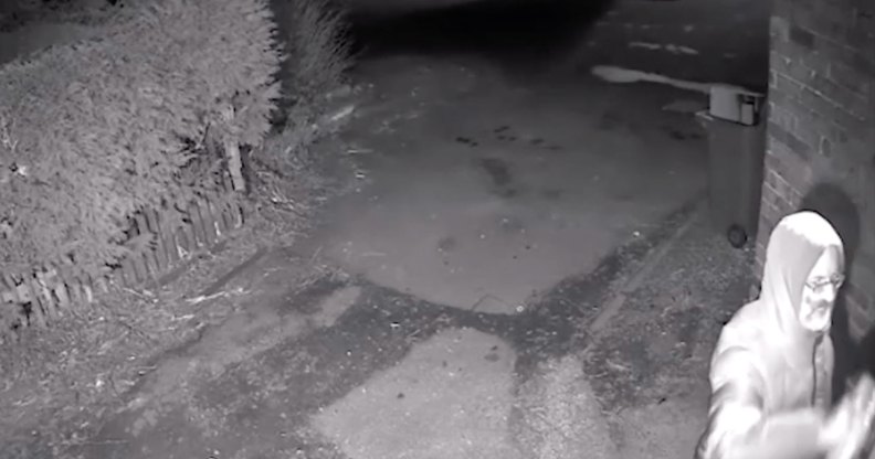 A still from the CCTV footage showing Parsons holding a can of spray paint