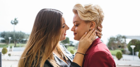 Lesbian couple about to kiss