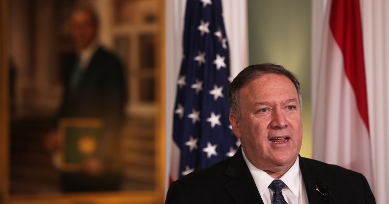 Mike Pompeo in front of a US flag